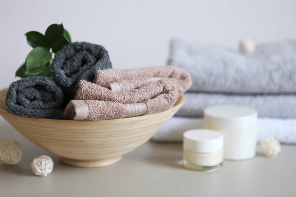 a stack of fresh towels on the table. - Photo, Image