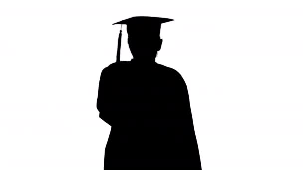 Silhouette Jeune étudiante diplômée en toux du manteau
. - Séquence, vidéo