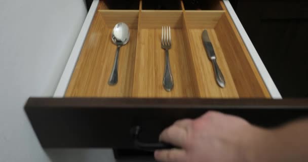 Minimalist kitchen tools put away in a drawer - Footage, Video