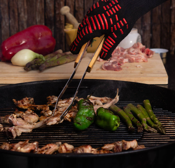 FAMILY BARBECUE OF LAMB AND VEGETABLES - Photo, Image