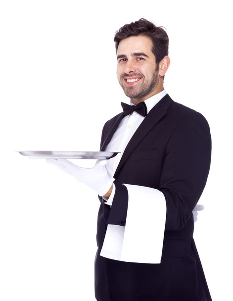Professional waiter holding an empty dish, isolated on white bac - Foto, imagen