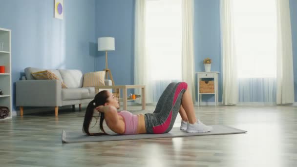 Woman Is Engaged in Belly Workout at Home - Footage, Video