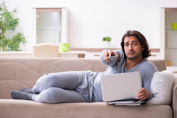 Young male employee freelancer working from home - Photo, Image