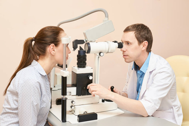 Eye doctor exam patient heath. ophthalmology concept - Фото, изображение
