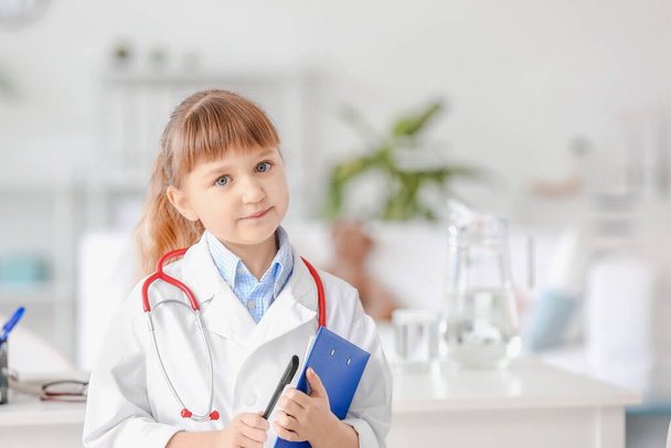 Cute little doctor in clinic - Photo, Image