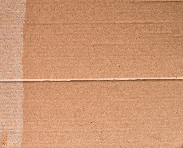 Kartonnen papiertextuur, bruin kartonoppervlak - Foto, afbeelding