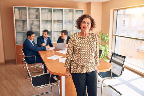 Business lawyers workers meeting at law firm office. Professional executive partners working on finance strategry at the workplace. Leader worker standing confident looking at the camera. - Photo, Image