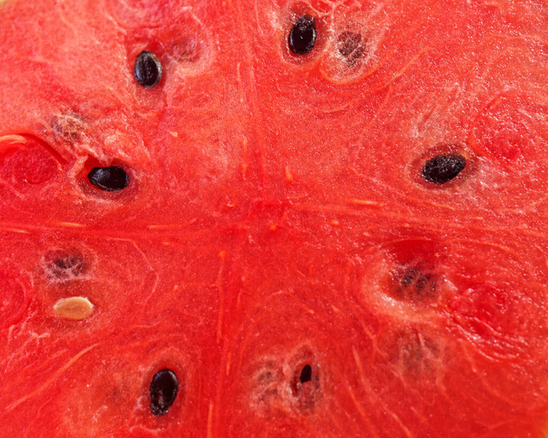 friss görögdinnye vágott felső nézet közelről, piros gyümölcs háttér - Fotó, kép