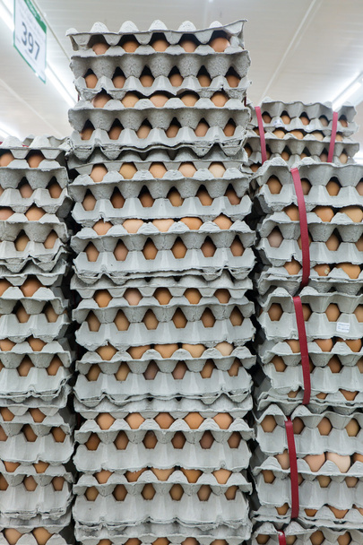 Stacked of eggs for wholesale at the market - Photo, Image