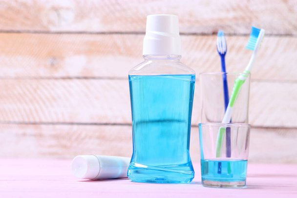 mouthwash on the table. Products to maintain oral cleanliness. - Photo, Image