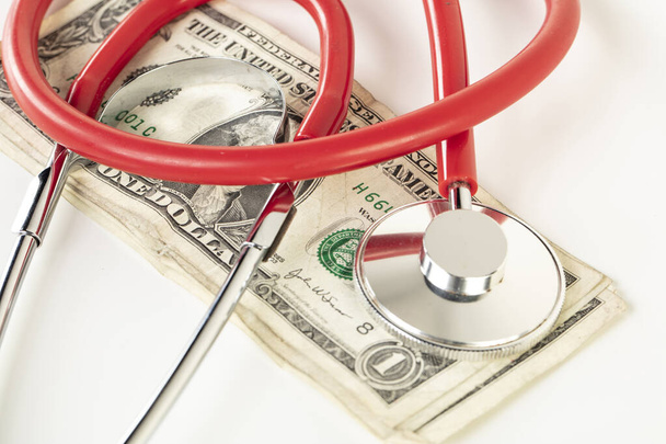  US dollar examined with a stethoscope, concept of healthy money and American economy - Foto, Imagen