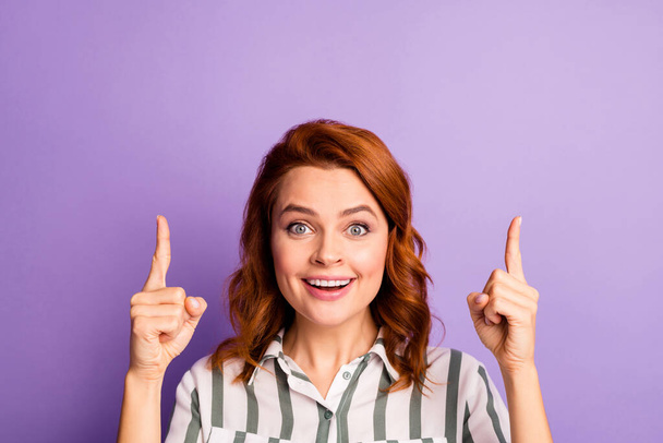 Close up photo of amazed funky crazy woman point index finger copy space indicate incredible ads promo scream wow omg wear formalwear style outfit isolated over violet color background - Foto, Imagem
