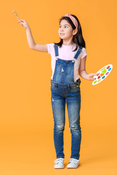 Cute little artist on color background - Photo, image