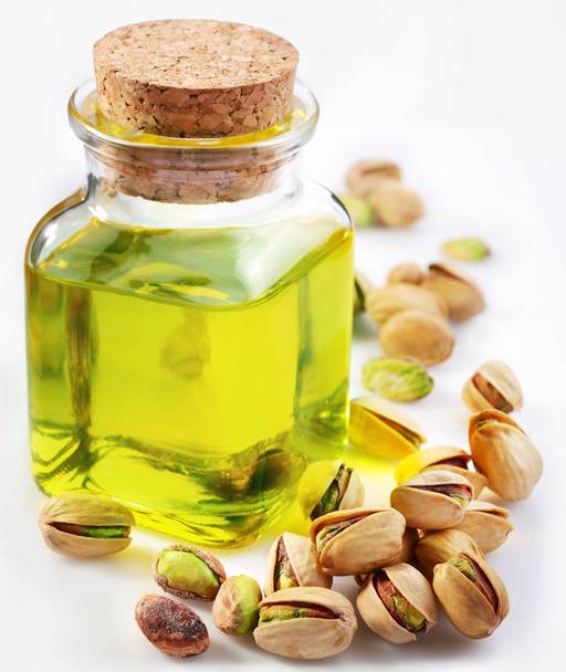 Pistachio oil with nuts - Valokuva, kuva