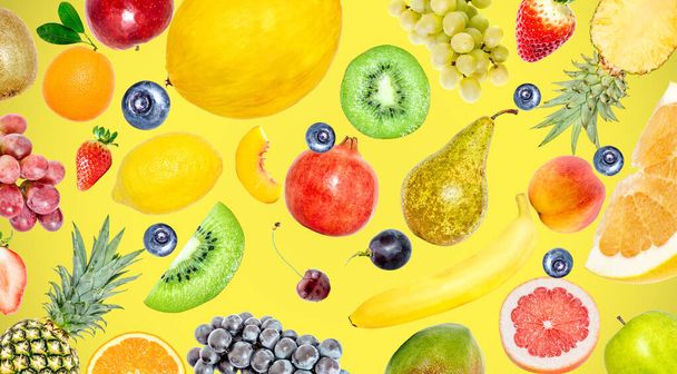 Creative photo of many different exotic tropical bright fruits on a yellow summer background. View from above. Bright summer fruit pattern. - Фото, изображение