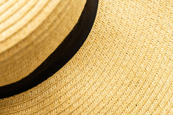 Close up shot to see the detail of straw hat weave texture detail. Craft and handmade product during summer season. Ideal for wallpaper, background with copy space for text, - Fotoğraf, Görsel