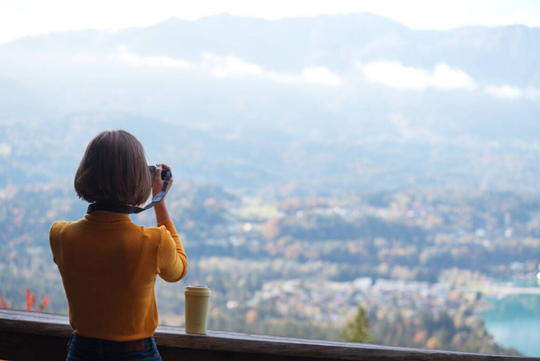 girl travels and takes pictures on camera - Photo, Image