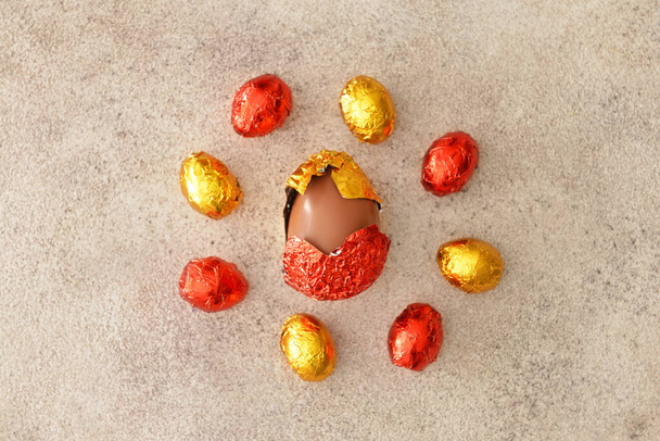 Sweet chocolate eggs on color background - Photo, Image