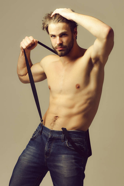 Handsome bearded man in jeans - Photo, Image