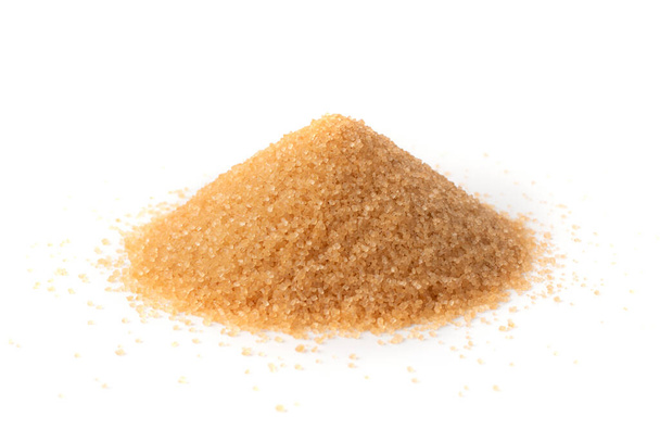 Pile of brown sugar isolated on white background. Raw unrefined cane sugar heap side view - Photo, Image