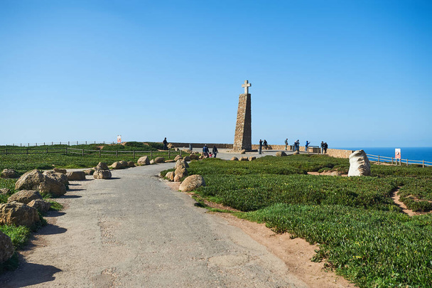 Cabo da Roca, Portugal - February 27, 2020: The westernmost point of the mainand Europe. The cross and the monument to the most occidental point of Europe - Foto, imagen