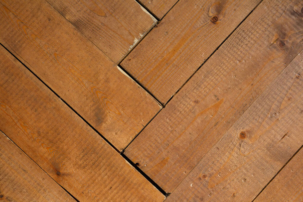 natural wood background and texture, surface old brown planks folded by herringbone or zigzag - Fotografie, Obrázek