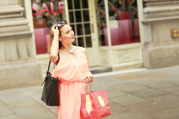 young woman enjoying a day out shopping - 写真・画像