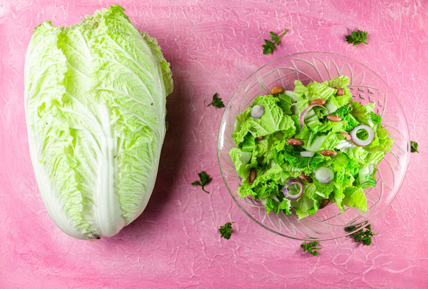 Fresh napa cabbage salad served on table, flat lay. Space for text - Photo, Image