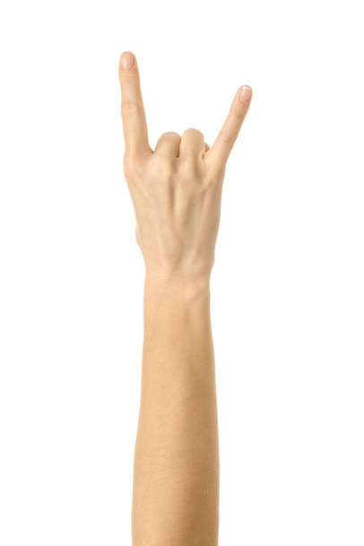 Rock and roll! Woman hand with french manicure gesturing isolated on white background. Part of series - Foto, afbeelding