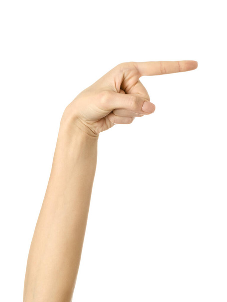 Pointing right. Woman hand with french manicure gesturing isolated on white background. Part of series - Photo, image