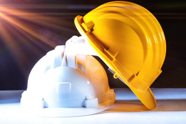 Two hard hats, building and working concept. - Photo, Image