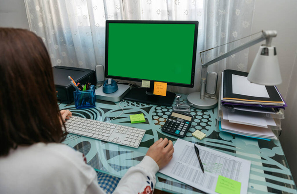 Woman looking at computer screen - Photo, Image