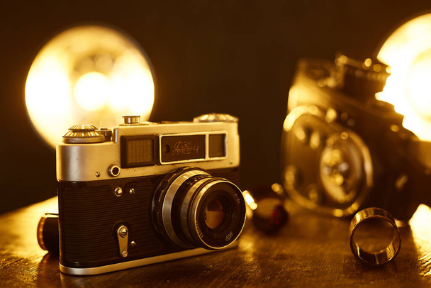 Retro analog camera. Old film camera. - Foto, afbeelding