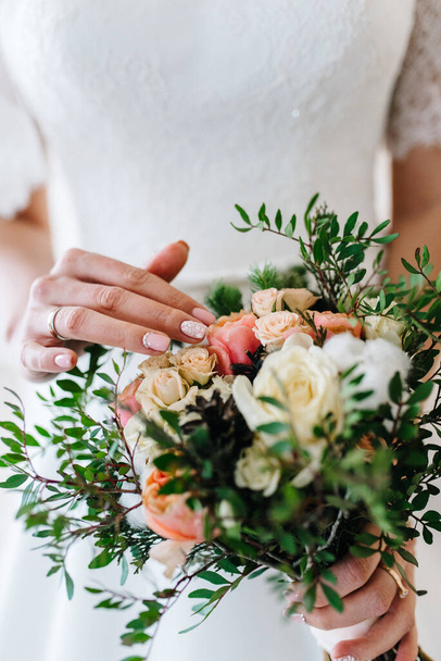 elegant wedding bouquet of fresh natural flowers and greenery - 写真・画像