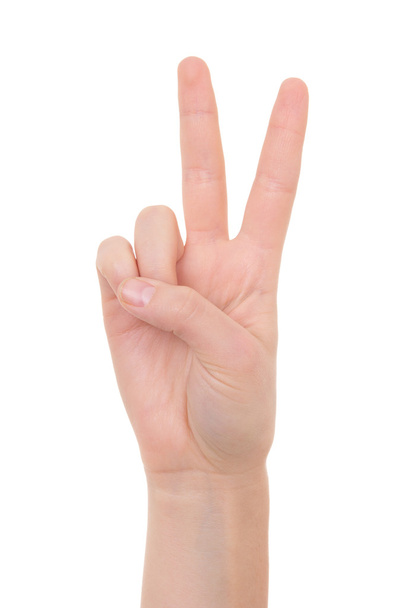 mujer mano mostrando el signo de la paz aislado sobre fondo blanco - Foto, Imagen