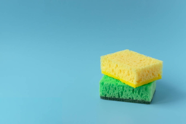 Sponge for washing dishes. Detergent for washing dishes. Spring cleaning at home - Valokuva, kuva
