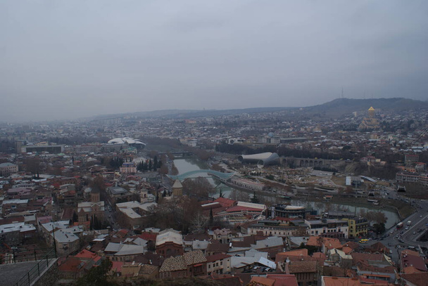 Tbilisi is a very beautiful city with an ancient history. There are stunning high hills, delicious food and beautiful architecture. No filter - Photo, Image