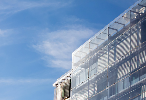 Modern glass architecture against the blue sky - Photo, image