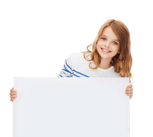 Smiling little girl with blank white board - Fotó, kép
