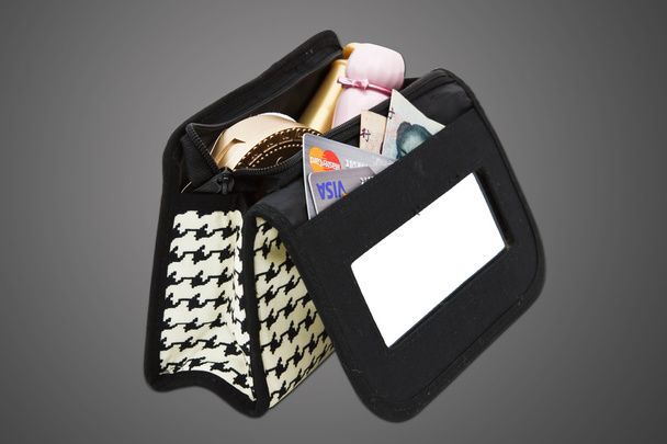 Make up bag with cosmetics isolated with path - Foto, afbeelding