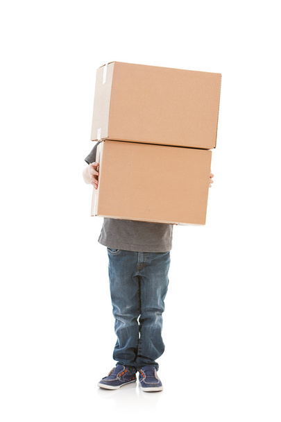 Family: Little Boy Carries Stack of Moving Boxes - Photo, image