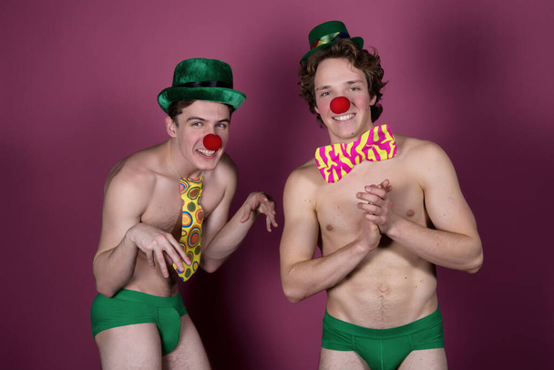 Clowns and holiday. Two sexy guys. - Photo, Image
