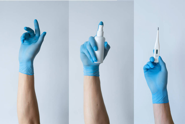 Flat lay of Coronavirus protection, medical protective masks, gloves, hand sanitizer bottles, antiseptic, disinfection, spray on white background isolated , copy space - 写真・画像