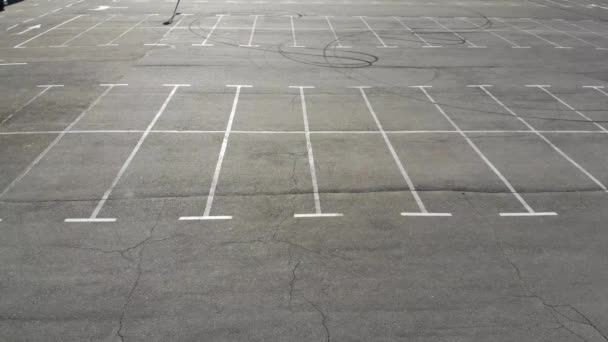 Aerial drone shot of the empty parking lot of a supermarket due to Corona virus pandemic - Footage, Video