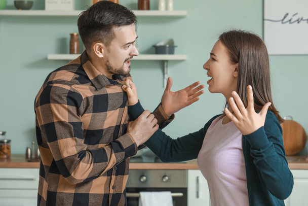 Young couple quarreling in kitchen - Photo, Image