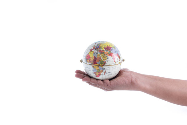 Globe on hand isolated on white background - Photo, Image