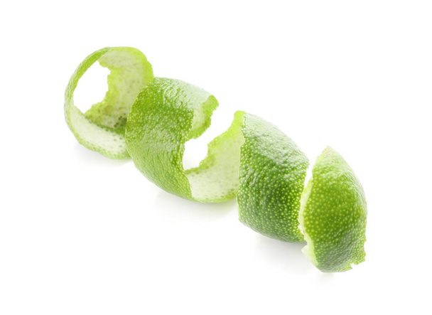 Peel of green lime on white background - Fotó, kép