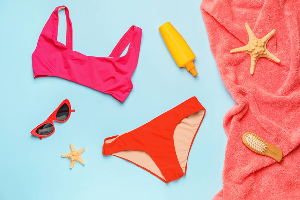 Summer composition with beach accessories on color background - Photo, Image