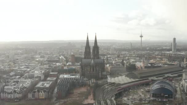 AERIAL: Cologne Hohenzollern Bridge and View on Cathedral with Central Train Station in beautiful hazy Sunlight  - Footage, Video
