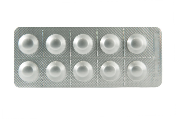 Isolated aluminum blister pack on white - Photo, Image